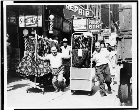 Men pulling racks of clothing on busy sidewalk in Garment District, New York City / World Telegram & Sun photo by Al Ravenna.  Fecha	1955 Nyc Garment District, Garment District Nyc, Nyc Vintage, Penn Station, New York City Photos, Vintage Nyc, New York Pictures, New York Vintage, Old New York