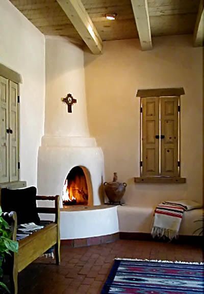 kiva + brick 'molding' along floor Adobe Fireplace, Southwest Interiors, Southwestern Kitchen, Kiva Fireplace, Duke City, New Mexico Homes, Adobe Home, Small Fireplace, Southwestern Home