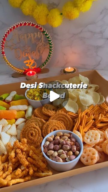 Sweety Oukabay on Instagram: "DESI SNACKCUTERIE BOARD

Serving up a flavor fiesta with my Veggie Desi Snackcuterie Board, where crispy bites meet spice delight!🌶️🥨

This board contains:
Softly chakli @jaiminsnacks 
Soya stick @jaiminsnacks 
Khatta meetha @bikajiuk 
Mini poppadums @lailafoodsuk 
Masala kurkure @kurkuresnacks 
Wheels masala @balaji_wafers_uk 
Kharising (peanuts) @jabsonsfoods 
Fryums @topopfoods 

All can be found @picknsavestore 

#snackcuterieboard #indiansnacks #desifood #diwali2023 #partyfood #diwali #charcuterieboard #fryums #farfar #vegetarian" Snackcuterie Board, Diwali Charcuterie Board, Diwali Platter, Balaji Wafers, Diwali Snacks, Diwali Party, Desi Food, Snacks For Work, Indian Snacks