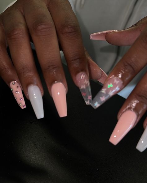 Obsessed with these pink coffin nails featuring butterfly encapsulated designs! 🦋✨ Perfect for adding a little pretty touch to your summer style. Let us elevate your nail game 💅🏽 #lanailtech #carsonnails #longnails #theynotlikeus #PinkCoffinNails #ButterflyNails #NailArt #ManicureMagic #NailGoals #NailInspo #SummerNails #NailDesigns #pinknails #whitenails Nails Coffin Butterfly, Short Coffin Butterfly Nails, Long Pink Butterfly Nails, Pink Chrome Butterfly Nails, Incapcilated Butterfly Nails, Pink Coffin, La Nails, Instagram Nails, Butterfly Nail