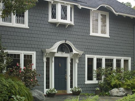 Want a fresh new look for the outside of your home? Get inspired by these eye-catching exterior paint color schemes from HGTV.com. Gray Home Exterior, Outside House Paint Colors, Modern Exterior Paint Colors, House Paint Design, Outside House Paint, Exterior Paint Color Schemes, Exterior Gray Paint, Turquoise Paint, Turquoise Door