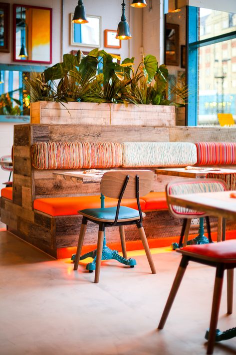 Vibrant Restaurant Interior, Restaurant Orange Design, Colourful Cafe Interior, Colourful Restaurant Design, Restaurant Banquette Design, Colourful Restaurant Interior, Quirky Restaurant Interiors, Orange Banquette, Colorful Restaurant Design