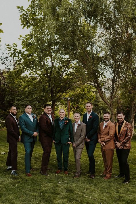 Mismatched Jewel Toned Groomsmen Suits #groomsmen #groomsmensuits #mensfashion #menstyle #retrowedding #70swedding #weddingideas #retrofashion #menssuits #mensuits #groom #groomsmenpose #groomsenphoto #fallgroom #fallweddingaesthetic #fallwedding #outdoorwedding #weddingparty #weddingdesign #fallweddinginspo #fallweddingideas #emeraldgreen #weddingcolors #fallweddingcolors #jewelcolors #fallcolors #fallcolorpalette #fallweddinginspo #groomsmenphotos Groomsmen In Different Colors, Groomsmen Velvet Jacket, Mixed Color Groomsmen Suits, Boho Mens Wedding Attire Mismatched Groomsmen, Autumnal Groomsmen, Autumn Groomsmen Suits, Cottagecore Groomsmen, Groomsmen Multicolor, Groomsmen Jewel Tone