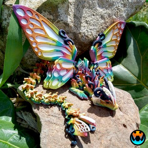 Butterfly Dragon, Cinderwing3d, Articulating Flexi Dragon, Spring Fairy Dragon, Print-in-Place, No Supports Dragon Butterfly, 3d Printed Stuff, Butterfly 3d, Dragon 3d, Butterfly Dragon, Spring Fairy, 3d Printer Designs, Fairy Dragon, 3d Printing Ideas