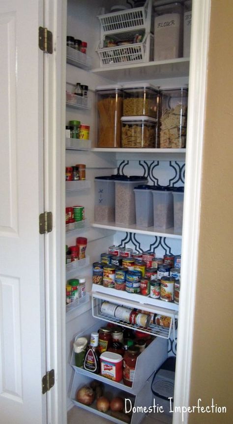 My pantry was a hot mess and I could never find what I needed, so I decided it was time to do something about it. I emptied it out, painted and stenciled, and thoughtfully replaced everything. I'm happy to say that over a year later it is still organized! Click through to the post to read more and find links to the products used. http://www.domesticimperfection.com/2012/02/less-mess-project-pantry-reveal/ #Storage Condo Closet, Pantry Upgrade, Organize Life, Small Pantry Organization, Floor Makeover, Entryway Closet, Pantry Remodel, Pantry Makeover, Pantry Shelving