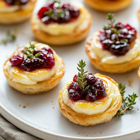 Easy Cranberry Brie Bites - Krystel's Cooking Three Ingredient Cranberry Brie Bites, Cranberry Phyllo Brie, Cranberry Brie Bites With Orange Marmalade, Small Bites Thanksgiving, Easy Cranberry Brie Bites, Savory Snacks For Christmas, 3 Ingredient Cranberry Brie Bites, Caramel Brie Tartlet, Thanksgiving Phyllo Appetizers