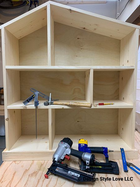 How to Build a Dollhouse Bookcase | Design | Style | Love Diy Wooden Dollhouse Plans, Dollhouse Building Plans, Pottery Barn Dollhouse Bookcase, Diy Dollhouse Bookcase, Pottery Barn Bookshelf, Dollhouse Woodworking Plans, Build A Dollhouse, Pottery Barn Dollhouse, Homemade Dollhouse