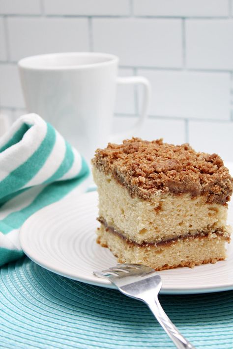 "This copycat Starbucks cinnamon coffee cake recipe takes the classic coffee cake and  streusel topping and gives it a kick of even more sweet cinnamon flavor with a delicious cinnamon sugar layer in the center! It’s a wonderful twist on coffee cake that takes everything we love about this classic sweet treat and amplifies it! The moist, crumbly texture, sweet cinnamon flavor, and cinnamon streusel topping makes this coffee cake so delicious. To keep things interesting, I decided to take cake Starbucks Cinnamon Coffee Cake, Starbucks Coffee Cake, Peanut Butter Twix, Cinnamon Streusel Topping, Panera Recipes, Vegetarian Holiday Recipes, Classic Coffee Cake, Cinnamon Streusel Coffee Cake, Chess Pie Recipe