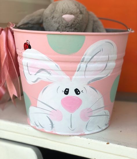 Bucket Painting Ideas, Diy Paint Bucket Ideas, Hand Painted Easter Baskets, Painted Metal Buckets, Easter Buckets Painted, Painted Easter Bucket, Metal Easter Buckets, Painted Easter Buckets Girl, Painted Easter Baskets