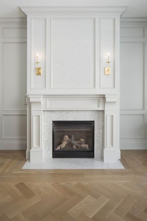 Wood Panels: Wood Panels Above Fireplace Fireplace Mantel Designs, Classic Fireplace, Marble Fireplace Surround, Herringbone Wood Floor, Herringbone Wood, Mantel Design, White Fireplace, Traditional Fireplace, Herringbone Floor