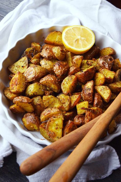 Lemon Garlic Potatoes Recipe | The Gracious Pantry Lemon Garlic Potatoes, Garlic Potatoes Recipe, Lemon Roasted Potatoes, Seasoned Potato Wedges, Greek Lemon Potatoes, Lemon Garlic Sauce, Potato Wedges Recipe, Garlic Roasted Potatoes, Greek Potatoes