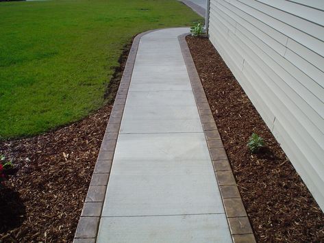 Pavers With Brick Border, Concrete Porch With Brick Border, Concrete With Paver Border, Concrete Walkway Around House, Concrete Patio With Paver Border, Diy Walkway, Front Walkway Landscaping, Stamped Concrete Walkway, Front Yard Walkway