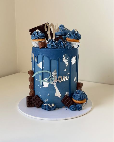 True blue baby I love you 🎶🎶🎶 are you singing…. What a stunner, this is a white chocolate ganache covered cake. Look at that curtain chocolate drip 💧and edible silver leaf to decorate! I’ve used @colour.mill denim oil based colour to colour everything ie. Chocolate ganache, chocolate drip and buttercream giving a cohesive finish. Que “Spotify play Madonna” #birthdaycake #trueblue #colourmill #denim #chocolateganache #ganashcake #cakedecorating #cakedesign #irishcakedesigner #cakeschoo... Blue Silver Cake, Ganache Covered Cake, Blue And Silver Cake, Spotify Play, 60th Cake, Irish Cake, Silver Cake, White Chocolate Ganache, Chocolate Drip