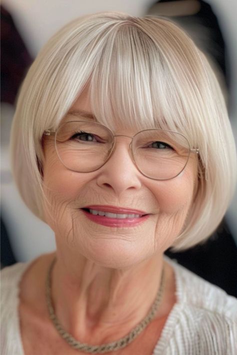 Short Rounded Bob with Bangs Hairstyle for Women Over 70 with Glasses. Bob Hair With Bangs Round Face, Short Stacked Bob Haircut Fine Hair With Bangs, Short Bob With Bangs Hairstyles, Soft Bob With Bangs, Rounded Bob Haircut With Bangs, Women Over 70 Fashion, Short Bob With Bangs Round Face, Bangs For Older Women With Glasses, Bangs With Glasses Round Face