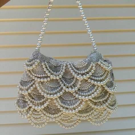 Brand New With Tags (Nwt) White Pearl Beaded Purse Size: Brand: Description Beautiful Pearl Hand Beaded Shoulder Bag Multiple Types Of Beads Thin Pearl Strap Clasp Closure Bead, Sequin, Rhinestone Detailing Baguette Shoulder Bag Shoulder Bag Hand Made In India Reminds Me Of Bags Similar To The Staud Beaded Bag. Zara Pearl Clutch Bag, And Anthropologie Fiona Beaded Shoulder Purse Similar Design To The Viral Cherry Beaded Bag From Marshall’s (Marshall’s) / Tj Maxx (Tjmaxx) Also Selling Other Beade Beaded Embroidery Purse, Handmade Beaded Bags, Aesthetic Designer Bags, Diy Beaded Bags, Beaded Pearl Bags, Beaded Embroidery Bag, Vintage Beaded Bag, Bead Bag Designs, Bead Embroidery Bag