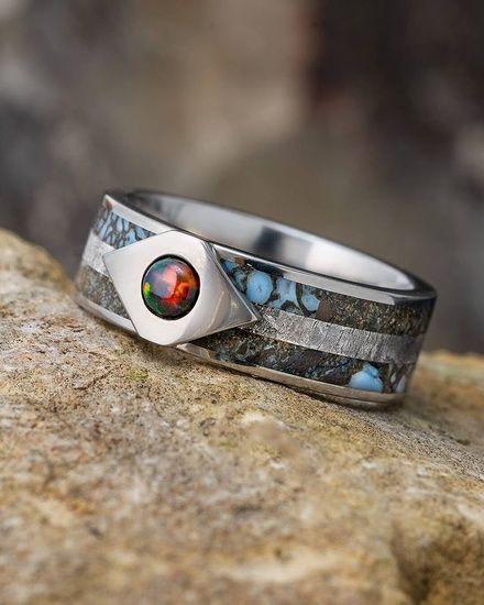 #fire #firering #blackfireopal #blackopal #opalrings #opaljewelry #weddingbands #engagementrings #titanium #titaniumrings #meteorite #meteoriterings #meteoritejewelry #authenticmeteorite #authentic #space #dinosaurbone #dinobone #timeandspace #jewelrybyjohan #jewelrygram #instajewelry #jewelryaddict #ringsofinstagram #ringsoftheday #madeinmn #shopsmall #oneofakind #fossil #fossiljewelry... Royal Peacock, Ring Armor, Black Fire Opal, Gibeon Meteorite, Meteorite Jewelry, Boulder Opal Ring, Gemstone Wedding, Unique Opal, Engraved Wedding Rings