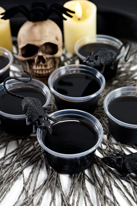 Black Jello Shots are best vodka jello shots to bring that spooky vibe to your Halloween party! They're yummy and easy to make boozy treats for adults or you can make them non-alcoholic for kids too! | jellojoy.com Black Jello Shots, Treats For Adults, Alcohol Jello Shots, Vodka Jello Shots, Best Jello Shots, Jello Shots Vodka, Halloween Jello Shots, Halloween Jello, Boozy Treats