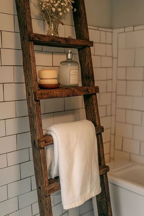 "Elevate your bathroom with the rustic elegance of a DIY Vintage Ladder Towel Rack! 🛠️🚿 Easy to make and perfect for a farmhouse or vintage-inspired look. 🌿✨ #DIYBathroomDecor #LadderUpcycle #TowelStorage" Upcycle Ladder, Vintage Ladder, Vintage Interior Design, Towel Rack Bathroom, Towel Storage, Diy Bathroom Decor, Vintage Interior, Diy Vintage, Bath Remodel