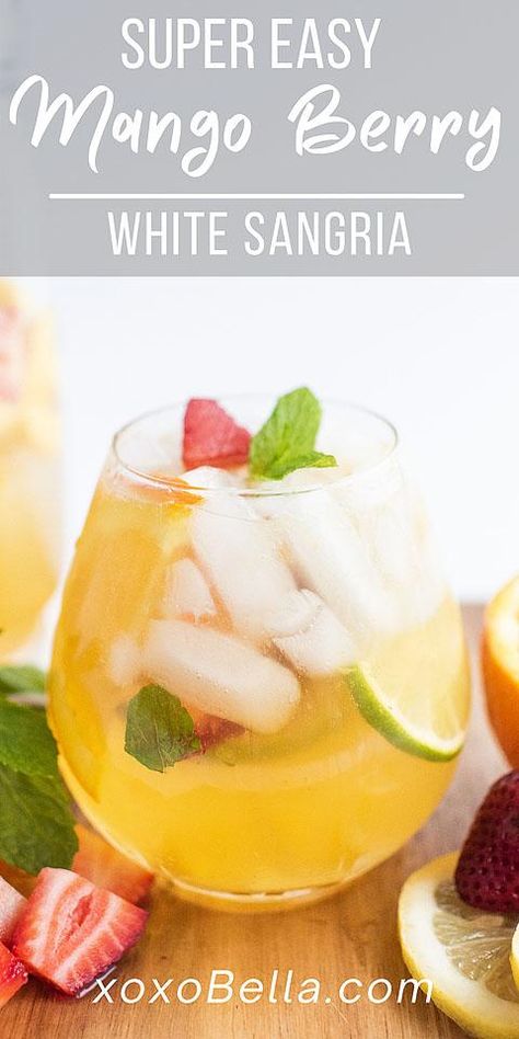 This mango citrus berry white sangria packs such a flavour punch. It’s a refreshing summer drink which everyone will love. Red sangria, made with red wine, might be the better known version, but this white sangria with summer fruit is the perfect choice for the summer. This is a super easy sangria recipe you can whip up anytime. If you are looking for a summer fruit cocktail recipe, you need to make this! #sangria #mango #lemon #orange #lime #strawberry #cocktail #whitewine #pitcher #... Mango Sangria Recipes White, Sangria Recipes With Rum, Easy White Sangria Recipe, Cherry Cocktail Recipes, Summer Fruit Cocktails, Mango Sangria, Easy Sangria, Recipes With Fruit Cocktail, Summer Sangria Recipes