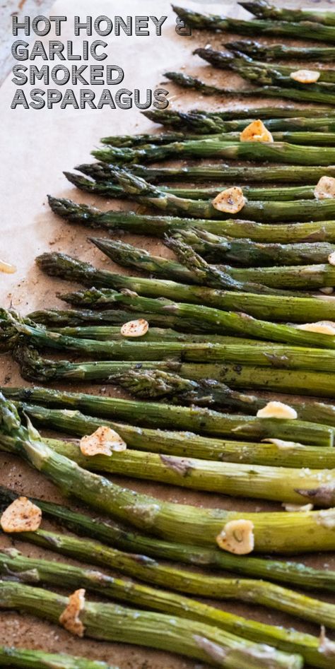 Discover how to elevate simple asparagus with the perfect balance of smoke, hot honey, and garlic. This dish is a must-try for any grill enthusiast! Smoked Asparagus In Smoker, Garlic Oil Recipe, Smoked Baked Potatoes, Cold Snack, Smoked Pork Tenderloin, Pellet Smoker Recipes, Queso Dip Recipes, Garlic Oil, Gourmet Treats