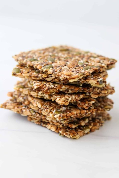 An ultra-crisp, gluten-free cracker made from seeds and cornstarch. Norwegian Seed Crackers, Dehydrated Crackers, Norwegian Crispbread, Gluten Free Carbs, Gf Crackers, Salty Crackers, Seed Crackers Recipe, Flax Crackers, Soda Crackers