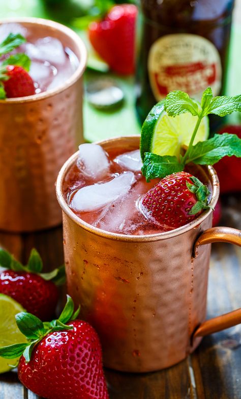 Strawberry Moscow Mules make a super refreshing summer cocktail. Made from ginger beer, vodka, lime juice, and fresh strawberries. Strawberry Moscow Mule, Moscow Mule Drink, Mule Drink, Moscow Mules, Moscow Mule Recipe, Strawberry Vodka, Mule Recipe, Refreshing Summer Cocktails, Southern Kitchens