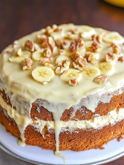 Heavenly Banana Walnut Cream Cake 🎂   𝗜𝗻𝗴𝗿𝗲𝗱𝗶𝗲𝗻𝘁𝘀:  For the Cake:  2 cups all-purpose flour 🍞  1 teaspoon baking soda 🧪  1/2 teaspoon salt 🧂  1/2 cup unsalted butter, softened 🧈  1 cup granulated sugar 🍬  2 large eggs 🥚  1 teaspoon vanilla extract 🍨  1/2 cup sour cream 🥛  3 ripe bananas, mashed 🍌  1/2 cup chopped walnuts 🌰  1/2 cup white chocolate chips For Filling and Topping:  2 cups creamy custard 🍮 1 banana, sliced (for garnish) 🍌 1/4 cup whole or halved walnuts 🌰 Banana Aesthetic, Cookie Recipes Gourmet, Banana Custard, Walnut Cream, Banana Dessert Recipes, Banana Walnut, Molten Chocolate, Chocolate Bundt Cake, Cookie Recipes Homemade