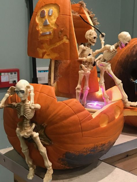 Pumpkin craving of a pirate ship with skeletons Pirate Ship Pumpkin, Pirate Ship Halloween, Halloween Pirate Ship, Pumpkin Pirate, Pumpkin Cravings, Pumpkin Pies, Pumpkin Ideas, Pirate Ship, Halloween Pumpkin