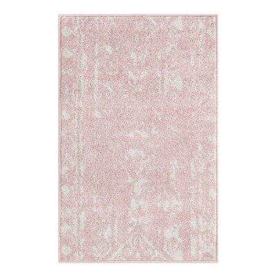 This boho-inspired area rug showcases a scrolling motif and a modern vibe that's just right for your living space. A striped design features geometric accents and botanical elements in pastel pink and white, with just the right amount of fading for a laid-back look. Power-loomed from polypropylene, it has a medium 0.5" high pile height, so it's best for lower traffic areas, such as your bedroom or home office. Best of all, this rug is stain-resistant and fade-resistant. We recommend pairing its Grey And White Room, Pink Dorm, Southwestern Area Rugs, Pink Glam, Solid Color Rug, Southwestern Rug, Boho Nursery Decor, Berry Ave, Linear Pattern