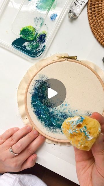 Stephie Manchester Embroidery on Instagram: "I painted this hoop months ago and I’ve still not finished stitching on top of it! It was so satisfying sponging the paint on like this and building the layers… Anyway enjoy 5 minutes of calming painting noises and tapping x (special hello to Ellie and Olly, I think of you two every time I share a video now!)" Painting And Stitching On Canvas, Paint And Stitch On Fabric, Painting And Embroidery On Canvas, Paint And Embroidery, Embroidery Hoop Art Diy, Cross Stitch Hoop, Sponging, Sponge Painting, So Satisfying