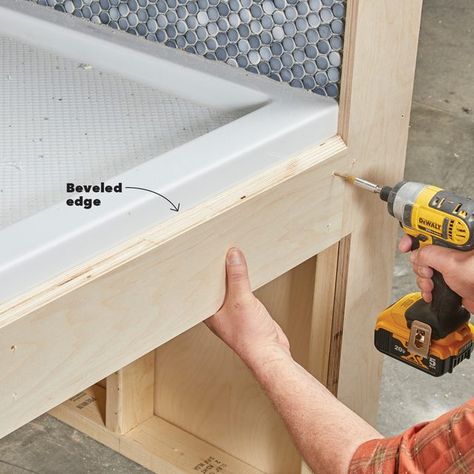 How to Build a DIY Dog Wash Station | Family Handyman How To Build A Dog Wash Station, Diy Dog Washing Station Indoor, Dog Washing Station In Garage, Diy Dog Bathing Station, Fiberglass Shower Pan, Dog Bathing Station, Diy Dog Wash, Dog Tub, Dog Wash Station