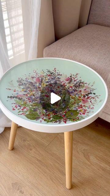 Craft Resin Epoxy - The Clear Choice for Artists & Crafters on Instagram: "🌸 Crafting Magic with Epoxy Resin and Flowers 🌸

In this mesmerizing video, a skilled resin artist @wildheartresinart brings a plain table to life using the enchanting combination of epoxy resin and vibrant flowers

The result is nothing short of magical! The harmonious blend of crystal-clear resin and delicate blooms transforms the table into a work of art 😍 

 Use my code WILDHEART20 for 20% off  at craft-resin.com❤️
Epoxy resin: @craft.resin 

#processvideo #floralpreservation #resinart #resinpour #functionalart #fluidart #epoxy #epoxyresin #epoxyresinart #resinartist #resinart_daily #resinart_ideas #craftresin #epoxytable #coffeetable #endtable" Resin Table Ideas, Resin And Flowers, Resinart Ideas, Resin Artist, Craft Resin, Floral Preservation, Resin Pour, Epoxy Resin Art, Resin Craft