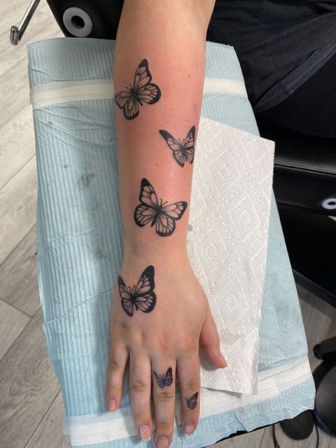 Butterflies Tattoo On Hand, Hand Butterflies Tattoo, Butterflies On Wrist Tattoo, Butterfly Up The Arm Tattoo, Butterfly Flying Up Arm Tattoo, Arm Butterflies Tattoo, Butterfly Around Arm Tattoo, Butterfly Tats On Arm, Butterflies Up Arm Tattoo