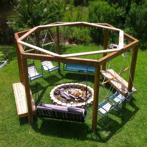 Hexagonal fire pit swingset with repurposed lawn chairs, bench swings, and fixed benches Diy Backyard Fire Pit, Fire Pit Plans, Outside Fire Pits, Fire Pit Swings, Backyard Fire Pit, Fire Pit Furniture, Fire Pit Area, Diy Fire Pit, Backyard Diy Projects