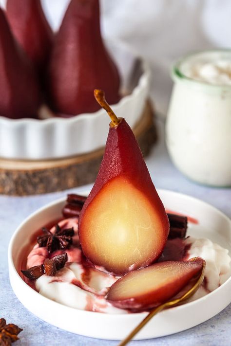 Spiced Red Wine Poached Pears are a delicious, easy and light winter dessert for your holiday meal. Vegan & Gluten-Free! Red Wine Poached Pears, Pear Recipes Easy, Poached Pears Recipe, Wine Poached Pears, Winter Dessert, Pear Dessert, Roasted Pear, Cherry Sauce, Spiced Pear