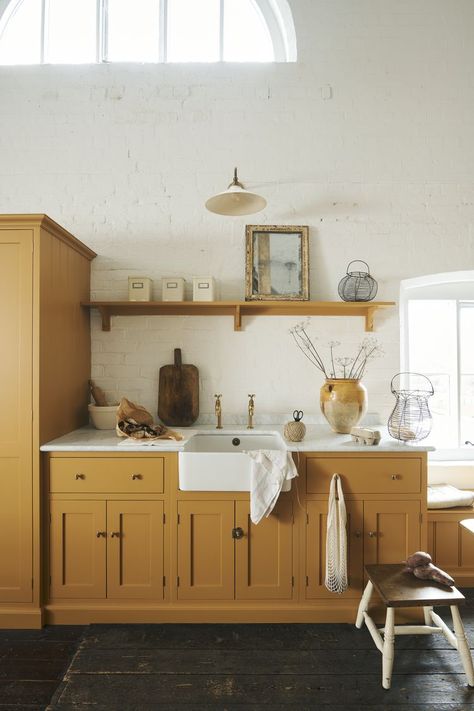 18 Yellow Kitchen Ideas That Bring a Playful Pop to the Cookspace Devol Kitchens Yellow, Yellow Kitchen Butcher Block Counters, Yellow Shaker Kitchen, Sudbury Yellow Kitchen, Mustard Kitchen Cabinets, Yellow Cottage Kitchen, Yellow Cabinets Kitchen, Small Narrow Kitchen Ideas, 70s Kitchen Aesthetic