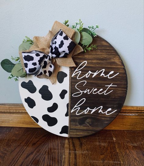 This is a 15 inch cow print themed door hanger, can be customized and made in a 18 inch as well, now available in my etsy shop⭐️ #decor #tiktok #cowprint #pinterest #doorhanger #doorwreath #farmhouse #homesweethome #rustic #etsy #etsyshop #etsyseller #custom #decor Cow Print Decor, Cow Print Door, Painting Glass Jars, Round Door Hanger, Door Crafts, Door Hangers Diy, Wooden Signs Diy, Door Signs Diy, Wooden Door Signs