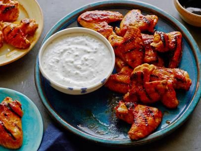 Chicken Wings with Red Hot Honey Glaze and Blue Cheese-Celery Dipping Sauce Recipe | Bobby Flay | Food Network Super Bowl Wings Recipe, Super Bowl Wings, Chicken Wing Flavors, Chinese Chicken Wings, Wings Recipes, Bobby Flay Recipes, Blue Cheese Sauce, Crispy Chicken Wings, Dipping Sauces Recipes