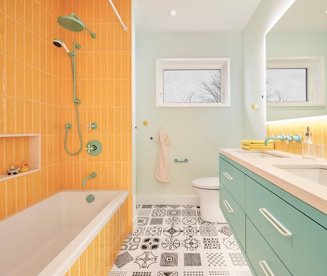 With pale teal and yellow, the kids' bathroom borrows from the bedrooms. Fixtures are by Rubinet Canada. Yellow Tile Bathroom, Yellow Bathroom, Colorful Kitchen, Yellow Bathrooms, Home Addition, Maximalist Decor, Young Family, Oak Floors, Kids' Bathroom