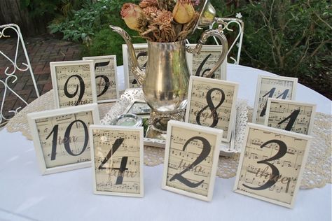 Print Table Numbers on Sheet Music ~ great for musicians! Romantic Wedding Table Decor, Vintage Wedding Decorations Diy, Romantic Wedding Table, Music Centerpieces, Wedding Decorations Diy Centerpiece, Sheet Music Wedding, Table Numbers Wedding Diy, Table Decorations Ideas, Wedding Table Themes