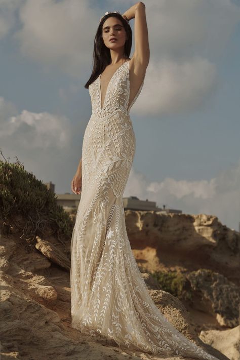 The SELENE Bridal Gown in Nude by RISH BRIDAL is a total showstopper! This gown is made entirely of lace developed by Rish, which features beautiful leaf motifs, scalloped shapes, and geometric elements. A plunging V-neckline, side cutouts, and a low back add to the wow factor of this gown that all of your guests will remember for years to come, while the fitted silhouette shows off your stunning shape. Pair this gown with our “Selene Top” for a more subtle yet sexy second look. Rish Wedding Dress, Rish Bridal Selene, Rish Bridal, Glam Wedding Dress, Alta Moda Bridal, Wedding Dress Types, Best Gowns, Secret Wedding, Boho Bridal Gowns