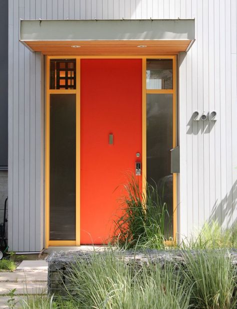 Orange front door Mid Century Orange Door, Mid Century Front Door, Orange Front Door, Yellow Front Door, Crittal Doors, Front Doors Uk, Orange Front Doors, Exterior Door Colors, Yellow Front Doors