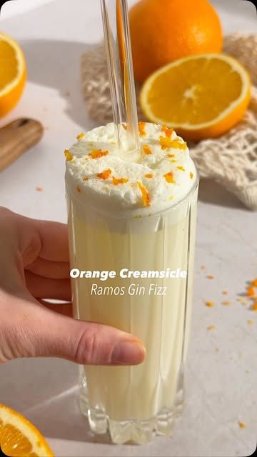 Kelly Pettit on Instagram: "Orange Creamsicle Ramos Gin Fizz 🍊☁️ trust me when I say she’s worth all the hassle!!

Ever since I saw @verygooddrinks make a dreamsicle nog (omg) I’ve been dreaming of orange creamsicle flavors! This may not be a nog, but it’s all things delicious - creamy, citrusy, and way too crushable. 

2 oz gin
1 oz orange juice, fresh
.75 oz lime juice, fresh
1 oz vanilla syrup
.75 oz heavy cream
Dash of orange blossom water
1 egg white 
Soda water
Garnish: Orange zest 

Method: combine all ingredients in a cocktail shaker without ice and dry shake vigorously. Add 1 medium cube and shake again, until cube dissolves. In a chilled Collins glass, fill 1/5 way with soda water, then Pour in cocktail. Let settle, then place in freezer for 5 mins. Remove from freezer, gently p