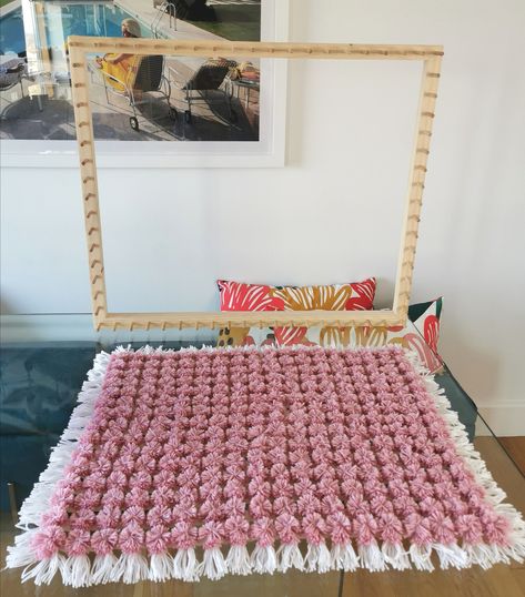 How to make a Pom Pom Blanket using a loom frame. Frame from Looming Mad Crafts on Etsy: www.etsy.com/uk/shop/LoomingMadCrafts #pompom #loom #pompomloom #pompomblanket #diyblanket #tutorial #crafts #diycrafts #easycrafts #beginnercrafts Loom Pom Pom Blanket, Pompom Blanket Loom, Homemade Loom How To Make, Pompom Blanket Frame, Pom Pom Blankets Tutorial, Pom Pom Baby Blanket Tutorial, Pom Pom Rug Diy How To Make, Loom Board Pom Pom Blanket, Pom Pom Loom Blanket