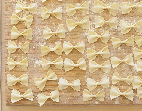 Flour and water are all you need to make authentic Italian pasta shaped into farfalle (bow ties) at home. Pasta Machine Recipes, Farfalle Pasta Recipes, Making Pasta From Scratch, Italian Sides, Pasta Design, Homemade Pasta Recipes, Bow Tie Pasta Recipe, Noodle Recipes Homemade, Fresh Pasta Dough