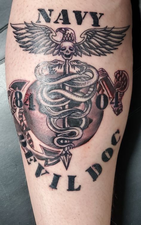 This is the Cadeuces with the Marine Corps EGA and 8404 Devil Doc added. Navy Corpsman Tattoo, Corpsman Tattoo, Us Navy Tattoos, Infantry Marines, Navy Boot Camp Graduation, Hospital Corpsman, Navy Hospital Corpsman, Navy Tattoos, Navy Corpsman