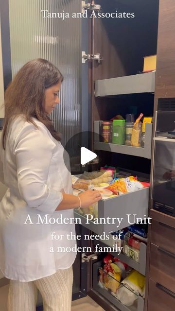 Tanuja and Associates on Instagram: "⚖️A well-designed pantry is essential for a functional and organized kitchen. 

Modern pantry units, with features like pullout drawer racks and stacked racks attached to the door (as shown here), make it easy to access and organize your items. 

👇Here are some things to keep in mind while designing modern pantries, to make sure all your groceries and kitchen essentials are safe, accessible, and organized. 

1️⃣ Design for Accessibility: Incorporating modular designs (pullout drawers, rotating racks etc.) to ensure every item is within easy reach, reducing the need to dig through shelves.

2️⃣ Material Selection: We opted for profile shutters with fluted glass for a contemporary look and veneer finishes for a touch of warmth. These materials are not on Pantry Units In Kitchen, Pullout Pantry Organization, Glass Profile Shutter Kitchen, Modern Pantries, Pantry Unit Design, Pantry Unit Kitchen, Pax Pantry, Pantry Pullout, Pantry Unit