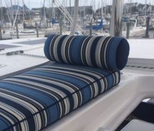 customer's relaxing sailboat cushions | "Here are the cushions that were done for our Leopard 48 catamaran. The accent pillows look great and the bench seat cushion and bolster allow for someone to sit behind the captain and watch the boat steering and sail management." Featured Fabrics: Outdura Tradewinds Nautical & Outdura Scoop Sapphire Trawler Boats, Liveaboard Boats, Boat Interior Design, Boat Upholstery, Sailboat Interior, Custom Bench Cushion, Sailboat Living, Living On A Boat, Cruiser Boat