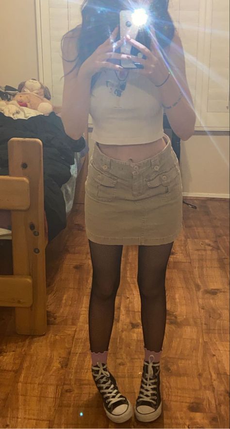 Khakis Skirts Outfit, How To Style Khaki Shorts, Beige Cargo Mini Skirt Outfit, Khaki Skirt Outfit Aesthetic, Beige Cargo Skirt, Short Beige Skirt Outfit, Khaki Skirt Uniform Outfits, Khaki Cargo Skirt Outfit, Tan Cargo Mini Skirt Outfit