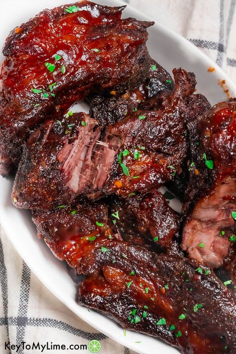 These delicious, tender, melt-in-your-mouth boneless country style beef ribs are packed with flavor and are super easy to make. The homemade spice rub takes the flavor to a whole new level, and then it’s coated in BBQ sauce to make it even more delicious. KeyToMyLime.com Country Style Beef Ribs, Beef Ribs In Oven, Beef Country Style Ribs, Boneless Beef Ribs, Bbq Beef Ribs, Loin Recipes, Ribs In Oven, Pork Loin Roast Recipes, Beef Ribs Recipe